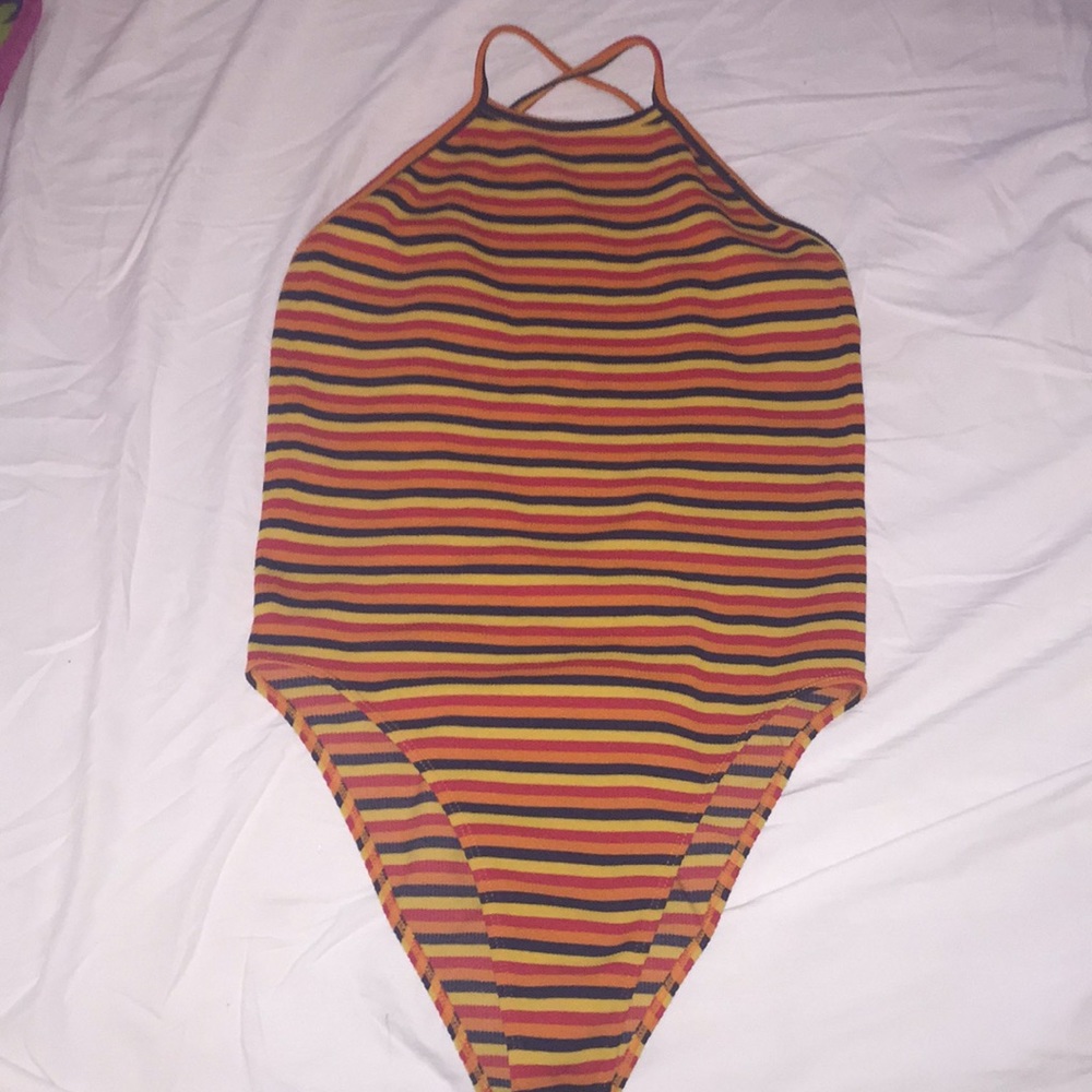 A striped body suit
